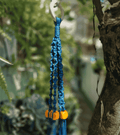Portamaceta de macramé estilo bohemio para plantas hecho a mano en El Salvador